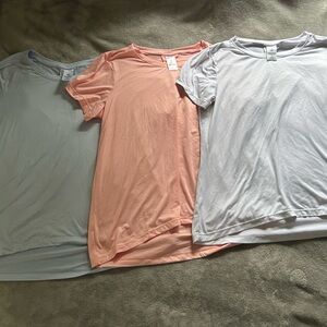 Three pairs of members mark womens T-shirts
